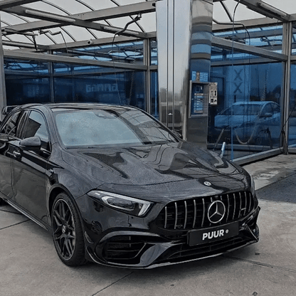 Demonstration of the Optimo™ PRO Drying Towel in action on a black car body - the microfiber instantly absorbs water and droplets, leaving a perfectly dry, shiny surface with no streaks or micro-scratches.